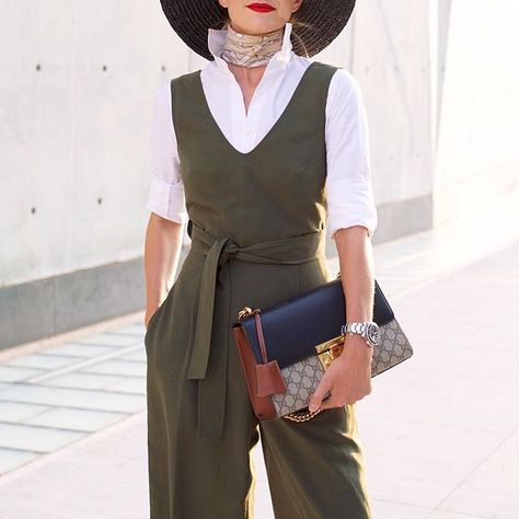 layers. olive jumpsuit with crisp white shirt. Shirt Under Jumpsuit, Olive Jumpsuit, Blair Eadie, Solid And Striped, Fashion Sites, Jumpsuit Outfit, Concrete Jungle, New Classic, Look Chic