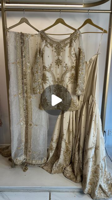 MAHA WAJAHAT KHAN on Instagram: ""𝗭𝗼𝗵𝗿𝗮" – Embodied Elegance in Ivory and Gold. An ethereal ensemble featuring an organza shirt and dupatta paired with raw silk farshi gharara. Exquisitely hand-embellished to radiate timeless beauty." • Now available in store! 📍Location: Idrees market, street#11A, F-10/2, islamabad Contact on +923072827111 • DM to get more information on these articles! #mahawajahatkhan #mahawajahatofficial #mahawajahatphotography #mahasphotography" Silk Gharara, Organza Shirt, Bridal Dresses Pakistan, Market Street, Jewelry Outfit, Raw Silk, Timeless Beauty, Bridal Dresses, Pakistan