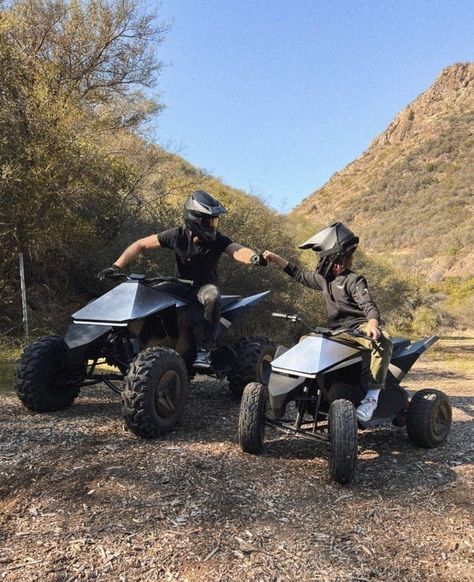 Tesla Cyberquad and Tesla Cyberquad for kids. Father and son doing a first bump while on the ATVs in an off-road setting. Tesla Cyberquad, Adventure Vehicle, Dog Pee Pads, Money Motivation, Tesla Car, Mini Electric, Car Rental, Names Of Jesus, Childcare