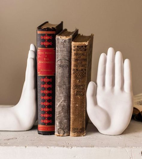 22 Creative Bookends You Need to See Cool Book Ends, Fun Bookends, Book Ends Ideas, Creative Bookends, Strange Decor, Bookends Decor, Ceramic Bookends, Quirky Products, Tj Max