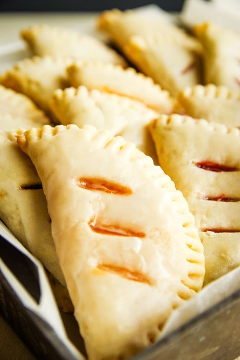 Baked fry pies with homemade dough recipe. These easy desserts can be made using your favorite filling like peach, cherry and apple. #frypie #pie #cleverlysimple Fry Pies, Fried Pies Recipe, Fried Peach Pies, Fruit Hand Pies, Homemade Dough Recipe, Premade Pie Crust, Pie Dough Recipe, Kitchen Aid Recipes, Peach Pie Filling