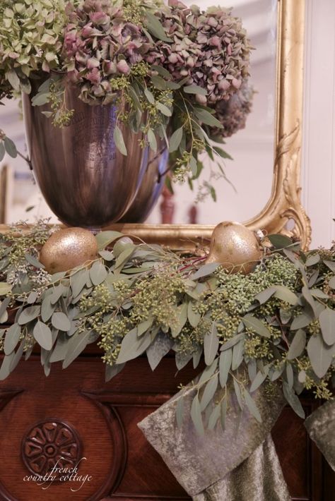 Country Cottage Christmas, Dark Blue Hydrangea, French Country Cottage Christmas, Eucalyptus Christmas, Christmas Mantles, Garland Mantle, Christmas Booth, Fireplace Mantles, Yellow Candles