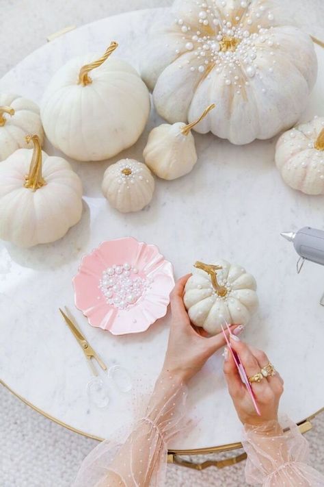 Fall is my favorite time of year. Between Halloween parties, Thanksgiving tablescapes and Christmas decor, I love DIY projects to help me decorate my home.This year my DIY project was Couture pumpkins. My main priority was to keep the project affordable while looking as luxe and over the top as possible. Aka, ballin’ on a budget honey! You can choose both or either of the pearl or rhinestone motifs and end up with a beautiful table top or a little accent on your desk Click here for instructions. Paint Pumpkins, Porch Diy, San Francisco Fashion, Halloween Tattoo, Fall Thanksgiving Decor, Pumpkin Decor, Pink Pumpkins, Baby Shower Pumpkin, Diy Pumpkin