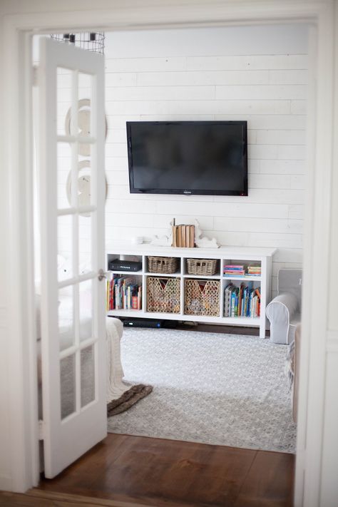 Peel and stick shiplap wood wall by stikwood Den And Playroom Combo, Photo Storage Ideas, Peel And Stick Wood Wall, Stick Wood Wall, Home Playroom, Family Room Storage, Small Tv Room, Wood Wall Planks, Kid Friendly Living Room