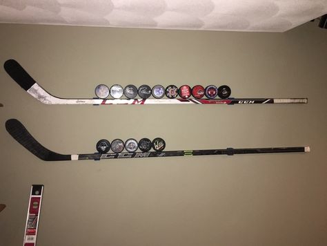 I added the v2 stick holder that has a little radius on the inside as recommended by BirchD. I love hockey and I've got a couple sticks from games I've been to, so I needed a way to put them up on the wall. I designed this in Solidworks and it works perfect. Hanging Hockey Sticks On Wall, How To Hang Hockey Sticks On Wall, Hockey Stick Wall Decor, Flags In Bedroom, Family Pictures On Wall, Ice Hockey Sticks, Hockey Room, Hockey Decor, Hockey Sticks