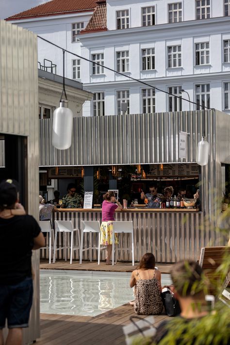 Manifesto Market in Prague is a food market housed in shiny metal cabins Metal Cabins, Metal Kiosk, Prague Food, Temporary Architecture, Temporary Structures, Kiosk Design, Outdoor Furniture Design, Metal Containers, Coffee Shop Design