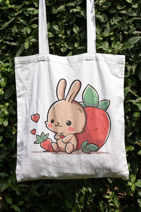 Adorable bunny with strawberry totebag, ideal gift for animal and fruit enthusiasts! Bunny With Strawberry, Bunny And Strawberry, Strawberry Tote Bag, Tutorial Origami, Baby Ganesha, Handpainted Bags, Adorable Bunny, Gift For A Friend, Diy Crafts Hacks