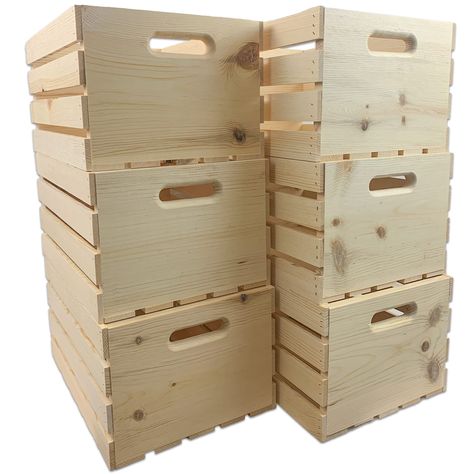 "Buy the Wilson® Enterprises 18\" x 10\" Pine Handle Crates, 6ct. a Michaels. com. These large crates provide an attractive backdrop for decorative items and offer functional storage solutions for various environments. With their rustic aesthetic, they bring laid-back charm to any space, serving as side tables or unique shelving systems. Elevate your organization and style with the versatile pine wood crates. These large crates provide an attractive backdrop for decorative items and offer functi Wooden Crate Bookshelf, Wood Baskets, Crate Bookcase, Unique Shelving, Dessert Cart, Farmers Market Booth, Market Booth, Stain On Pine, Booth Displays