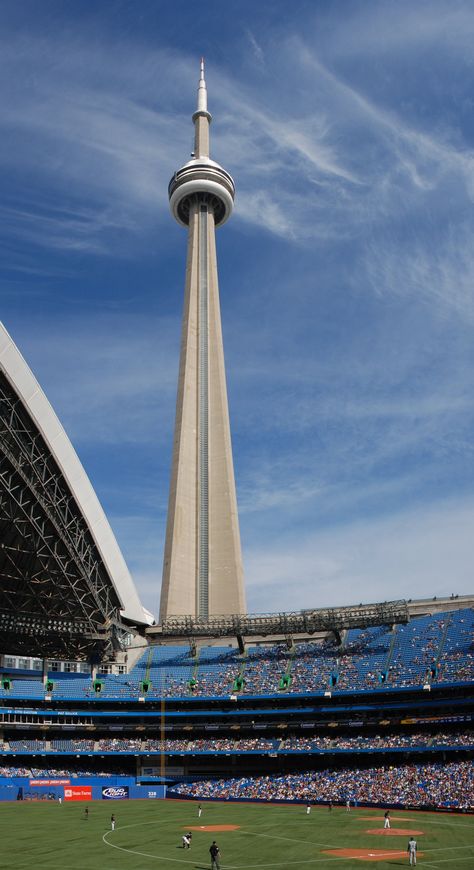 CN Tower and  Blue Jays baseball in Toronto Blue Jays Baseball, Baseball Stadium, Blue Jays, Cn Tower, Toronto, Tower, Baseball, Building, Travel