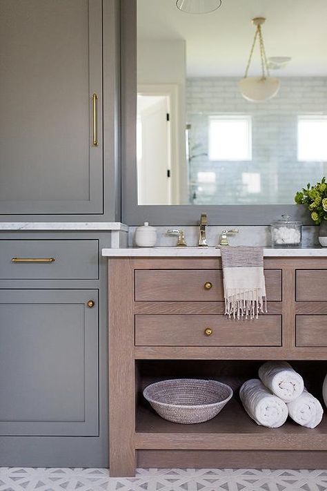 Gray shaker linen cabinets fitted with brass pulls sit against white and gray mosaic floor tiles and beside a brown oak dual bath vanity. Whittney Parkinson Design, Whittney Parkinson, Dark Bathroom Ideas, Dark Bathrooms, Linen Cabinets, Bad Inspiration, Transitional Bathroom, Home Luxury, Linen Cabinet