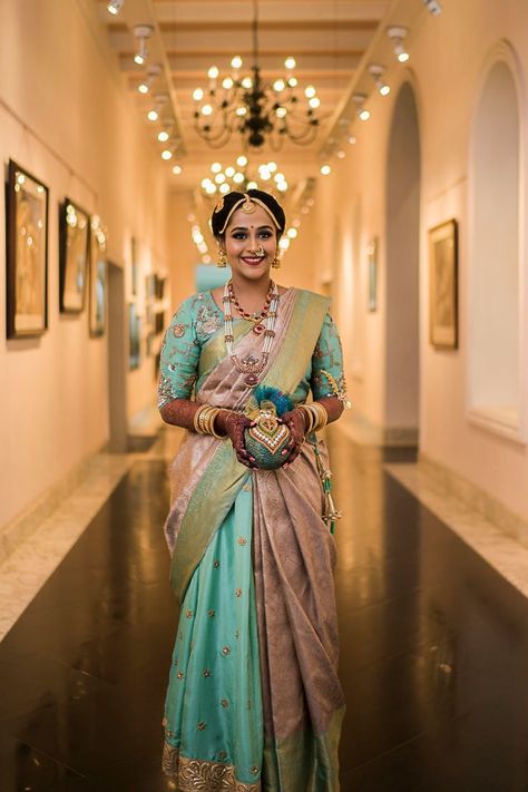 From South Indian brides beautifully decked up in Kanjeevaram to larger than life decor whilst being minimal and intimate, their each and every element make you fall in love! The sheer elegance and charm of a bride in sarees in unmatched. Not only Bridal sarees are extremely comfortable but, with modern brides not shying away from experimenting, they're also easy when you wish to create an unconventional look. South Indian Bridal Saree, Indian Bridal Looks, Saree South Indian, Pastel Lehenga, Indian Bridal Sarees, Indian Accessories, Bridal Makeover, South Indian Sarees, Indian Look