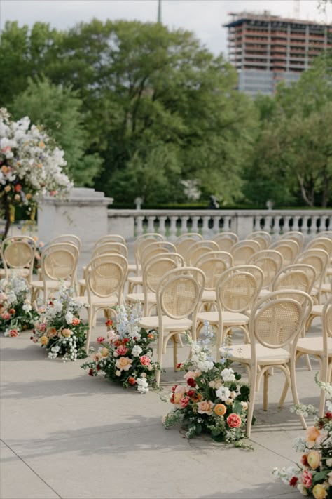 Vintage-inspired Outdoor Wedding Aisle Decor lined with colorful lush floral arrangements | wedding flower inspo, outdoor wedding aisle ideas, aisle flowers wedding, floral aisle marker wedding, wedding ceremony ideas, wedding ceremony decorations, wedding ceremony setup, wedding details, wedding ceremonial ideas, wedding ceremonies decorations, wedding ceremony backdrops, wedding flower inspiration, wedding aisle decor, wedding aisle decoration, weddings aisle decoration #weddingceremony Aisle Runner Flowers, Ceremony Aisle Markers, Flower Aisle Runner, Aile Flowers Wedding, Floral Walkway Wedding, Floral Aisle Decor, Outdoor Aisle Decor, Fall Aisle Flowers, Floral Aisle Markers