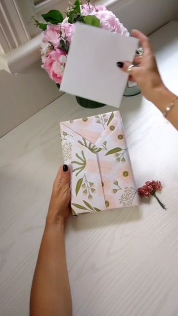 The Joy Party on Instagram: "A Beautiful way to wrap #effectivespaces #gift #gifted #giftwrapping #gift-wrapped #origami #giftidea #gifted #papercrafts #weddings #weddinggift #homemade #handmade" How To Wrap A Notebook Gifts, Bible As A Gift, Wrapping Tricks, Notebook Gift, Diy Wreaths, Notebook Gifts, Christmas Craft, Diy Wreath, Paper Mache