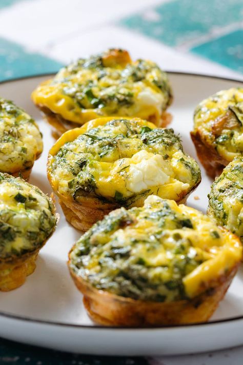 These Zucchini Egg Muffins are the perfect make ahead breakfast and they're freezer-friendly! They're made with sauteed zucchini, feta cheese, and lots of fresh herbs. The prep is super easy and you can serve them for breakfast or as a snack on-the-go. They're delicious both hot and cold, healthy, quick, and easy! Zucchini Feta Muffins, Zucchini Egg Bites, Zucchini Egg Muffins, Pesto Tortellini Salad, Zucchini Egg, Parmesan Crusted Zucchini, Zucchini Breakfast, Sausage And Veggies, Baked Egg Cups