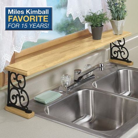 Repupose Over The Sink Shelf  ~ Hang upside down over the kitchen window to use as a plant shelf Over The Sink Shelf, Organiser Cucina, Counter Ideas, Model Dapur, Kitchen Ikea, Sink Shelf, Kabinet Dapur, Diy Kitchen Decor, Tiny Kitchen