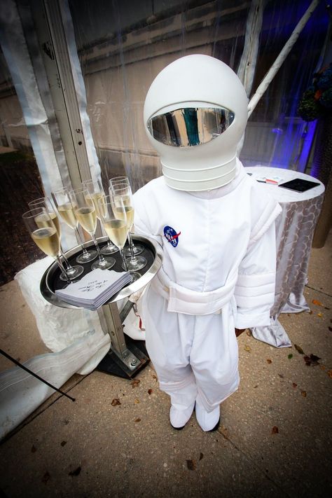 24 creative ways to throw a futuristic and space-themed party. Get inspired on PartySlate. #themedparty #themedpartyideas Nasa Themed Party, Elegant Space Theme Party, Sci Fi Party Ideas, Space Themed Halloween Party, Future Theme Event, Space Themed Event Decor, Intergalactic Party Theme, Future Party Theme Decor, Et Party Theme