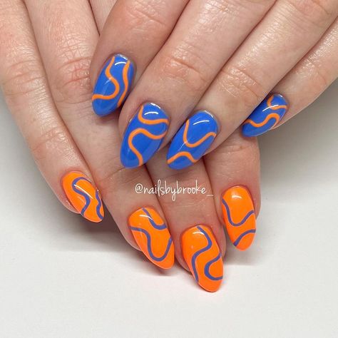 Cute Orange And Blue Nails, Orange And Blue Nails Fall, Tennessee Orange Nails, Fun Orange Nails, Blue And Orange Nail Ideas, Organge Nails, Orange And Blue Nails Design, Navy And Orange Nails, Teal And Orange Nails