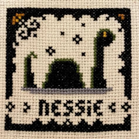 Tiffany Tzeng on Instagram: “#cryptidsal part 11: Nessie “The Loch Ness Monster, also known by the nickname Nessie, is said to inhabit Loch Ness in the Scottish…” Loch Ness Cross Stitch, Loch Ness Monster Cross Stitch, Cryptid Cross Stitch Pattern, Cryptid Alpha Pattern, Cryptid Cross Stitch, Dnd Cross Stitch, Crochet Alpha Patterns, Dark Embroidery, The Loch Ness Monster