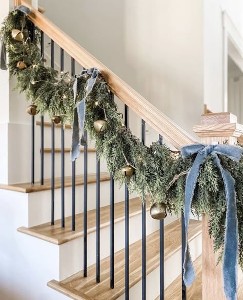 Dusty Blue Christmas Wedding, Christmas Garland Railing, Christmas Wreaths In Windows Outside, Christmas Bows On Picture Frames, Garland Stair Railing, Stairs Xmas Decorations, Christmas Decorations For Bay Window, Diy Garland Decor, Christmas Garland Ribbon