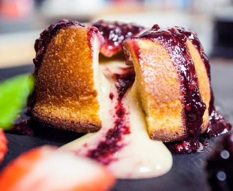 15 Molten Lava Cakes You Could Fall Hard For: White Chocolate Lava Cake White Chocolate Lava Cake, Blackberry Sauce, Lava Cake Recipes, Molten Lava Cakes, Molten Lava, Chocolate Lava, Chocolate Lava Cake, Lava Cake, Gateaux Cake