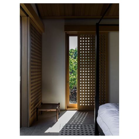 Walker Warner Architects on Instagram: “The perforated grid is the Huinawai signature. Pictured here: sliding screens for just a bit of light and a lot of privacy.…” Screen Doors, Tagaytay, Architects, Room Divider, Doors, Log In, Log, Curtains, Screen