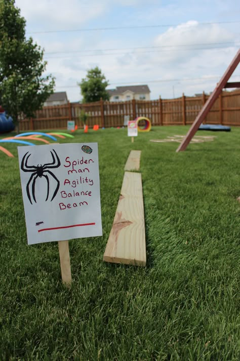 Superhero Training Center - Superhero Obstacle Course - Spider Man Agility Balance Beam-1" X 6" boards. We just had them in the garage. Spiderman Obstacle Course, Superhero Obstacle Course Ideas, Spider Man Obstacle Course, Spidey Birthday Party Games, Spider Man Birthday Activities, Spiderman Birthday Party Activities, Superhero Obstacle Course, Superhero Party Activities, Super Hero Training