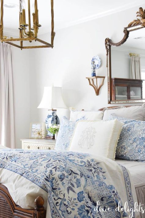 The Delightful Home {Master Bedroom} – Dixie Delights Traditional Blue And White Bedroom, Master Bedrooms Southern, Off White And Blue Bedroom, Southern Chic Bedroom Ideas, Blue And White Bedroom With Dark Furniture, Modern Grandmillenial Bedroom, Blue Southern Bedroom, Grand Millennial Bed, Blue French Bedroom Ideas