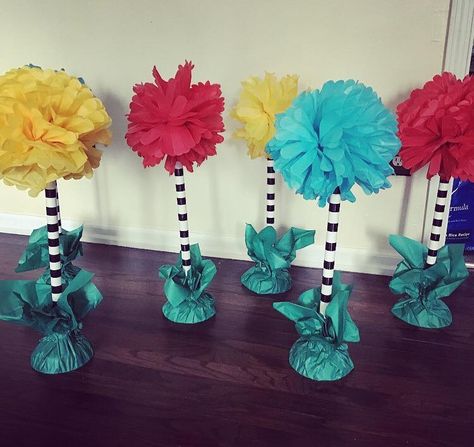 My DIY Dr. Seuss Truffula tree center pieces! Made out of dollar store toilet plungers! #drseuss #diy #truffulatrees #babyshower Dr Seuss Trees Diy, Diy Dr Seuss Decorations, Dr Seuss Diy Decorations, Dr Seuss Centerpieces, Dr Suess Decorations Diy, Truffula Trees Diy, Dr Suess Centerpieces, Dollar Store Baby Shower Ideas, Diy Truffula Trees