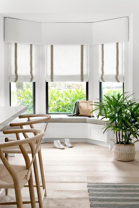 How To Decorate A Bay Window, Built In Kitchen Bench, Decorating A Bay Window, Bay Window Dining, Layered Window Treatments, Bay Window Benches, Transitional Lighting Fixtures, Bay Window Living Room, Saarinen Dining Table