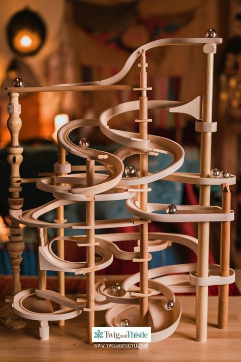 Build a fun marble run with these simple instructions. Perfect for creative minds and DIY enthusiasts. #MarbleRun #DIYProjects #Crafting #HomeFun #CreativeIdeas Marble Track Diy, Marble Run Ideas, Marble Run Diy, Diy Marble Run, Wood Robots, Goldberg Machine, Wooden Marble Run, Marble Tracks, Physics Projects