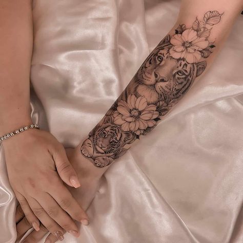 Flower Tiger Tattoo, Floral Tiger Tattoo, Tiger With Flowers Tattoo, Tiger Forearm Tattoo, Tiger Tattoo Ideas, Tiger Tattoo Designs, Half Arm Sleeve Tattoo, Lower Arm Tattoos, Arm Sleeve Tattoos For Women