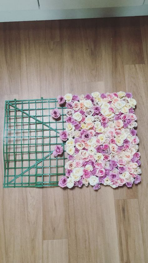 Half done Flower Wall Panel DIY Flower Wall Panels, Homemade Flower Wall, Portable Flower Wall, Flower Accent Walls, How To Make A Flower Wall, Diy Flower Wall Bedroom, Wall Panel Diy, Diy Floral Wall, Hanging Garden Ideas