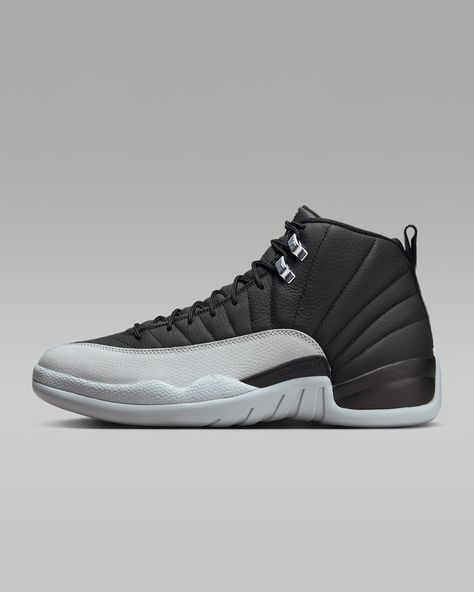 No need to call for a ride—MJ's game-winning look from '96 will get you where you need to go. This AJ12 is the return of Tinker Hatfield's celebrated design, the first to bring Zoom Air cushioning to Jordan's signature line. Premium materials give it a seasonal refresh, while the sunrise-inspired stitch lines on the upper hook back to the original. This is buzzer-beater style, perfected. Shown: Black/White/Wolf Grey Style: CT8013-010 Jordan 12 Black, Mens Grey Shoes, Tinker Hatfield, Air Jordan 12, Air Jordan 12 Retro, Grey Style, Jordan 12 Retro, Jordan 12, Stitch Lines