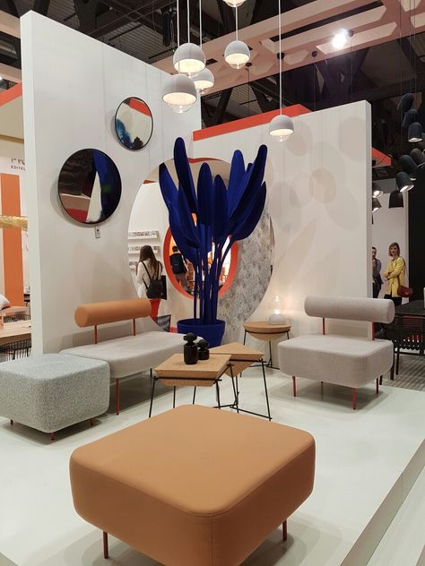 Neutral tones contrast with strong blue plant feature Milan Furniture Fair exhibition stand Furniture Store Design, Exhibition Display Design, Showroom Decor, Exhibition Stall Design, Milan Furniture, Showroom Interior Design, Exhibition Stand Design, Exhibition Booth Design, Showroom Design