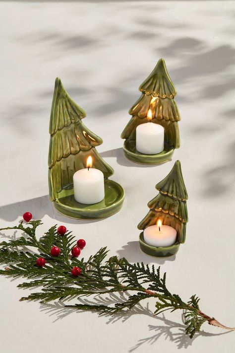 Set of three hand-painted stoneware tree votives with tea light plates. Tea lights not included. Tea Light Pottery, Christmas Tree Ceramic Decoration, Christmas Tea Lights, Christmas Tea Lights Crafts, Christmas Clay Decor, Holiday Pottery Ideas, Christmas Decor Clay, Christmas Ceramic Ideas, Diy Clay Christmas Decorations