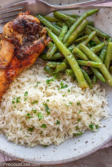 Turkey wing served with garlic herb rice and green beans. Oven Baked Turkey Wings, Garlic Herb Rice, Rice With Green Beans, Oven Baked Turkey, Rice And Green Beans, Bake Turkey Wings Recipe, Herb Rice, Turkey Pieces, Baked Turkey Wings