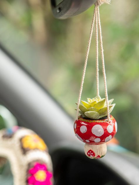 A little happy goes a long way! This Mini Hanging Succulent brings joy and inspiration to any small spot it inhabits. The life-like faux succulent is tucked in a tiny ceramic pot (which is also a precious little mushroom)!! It’s printed with a sweet message that will make your day. Twine holds up this cute little creat Car Desk, Mini Mushroom, Hanging Succulents, Sloth Gift, Stained Glass Window Hanging, Trinket Bowl, Cute Car Accessories, Rear View Mirror Charm, Hand Molding