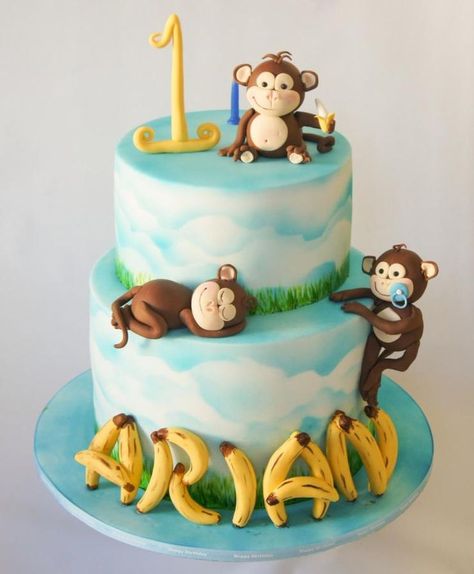 A birthday cake requested to have monkeys and bananas and blue and white colours. Monkey Theme Birthday Cake, Monkey And Banana Cake, Monkey First Birthday Cake, Monkey Theme Cake, Monkey Birthday Cakes, Red Velvet Birthday Cake, Boys First Birthday Cake, Monkey Birthday Parties, Monkey Cake