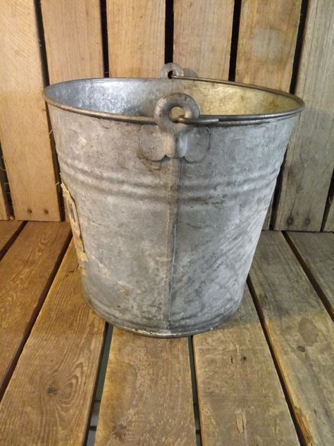 Vintage Lawson Metal Bucket. Measurements are 11x11x10 inches. Annie Props, Antique Sewing Machine Table, Family Heirloom Display, Milk Bucket, Antique Bucket, Old Bucket, Steel Bucket, Vintage Glassware Antiques, Tin Bucket