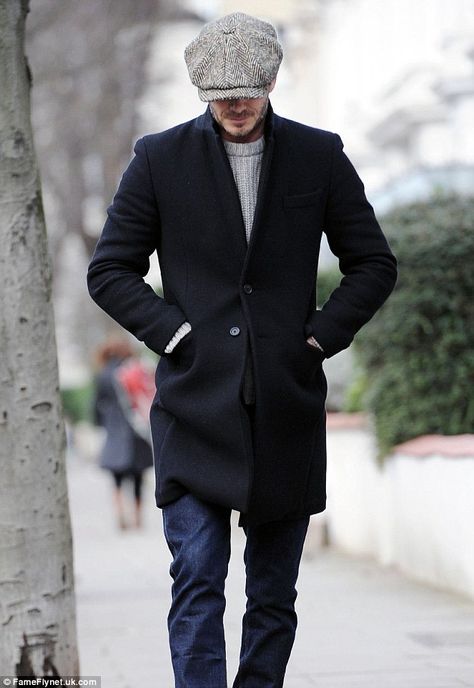 Style staple: David Beckham steps out in London on Monday morning wearing his usual Baker Boy cap and coat 40s Mens Fashion, Fashion For Men Over 40, David Beckham Style, Mode Mantel, Black Overcoat, Beckham Style, White Jeans Men, Blazer Outfit, Mode Casual