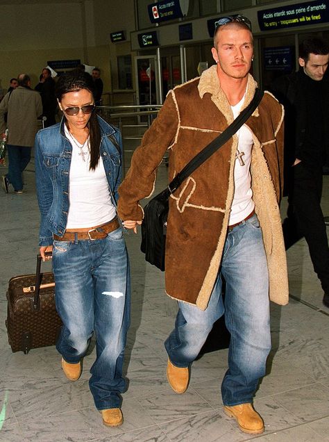 Victoria and David Beckham in matching Timberland's and jeans 2001 David And Victoria Beckham 2000s, David Beckham 2000 Style, David Beckham 2000s, David Beckham And Victoria, David Beckham Outfit, 2000s Hip Hop Fashion, David Beckham Family, David Beckham Style Outfits, Family Mansion