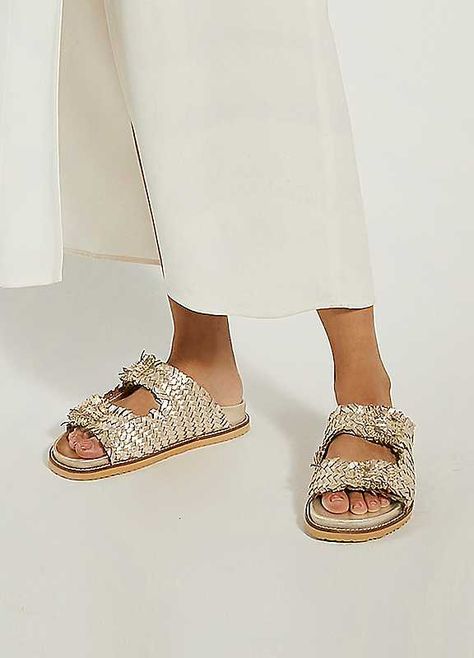 Style meets comfort with Lexingtons. Crafted from the finest strands of woven gold leather, this double-strap silhouette boasts two diamante buckles that sparkle with every step. Finished with contrasting stitch and pipe trims, and set on an ergonomic footbed providing all-day wear, Lexingtons is certain to add a touch of glamour to even the most casual of ensembles.Brand: Dune LondonUpper: LeatherLining: SyntheticSole: EVAHeel height approx. 1 cm Dune London, Flats Shoes, Casual Sandals, Gold Leather, Contrast Stitch, Me Too Shoes, Shoes Flats, Sparkle, London