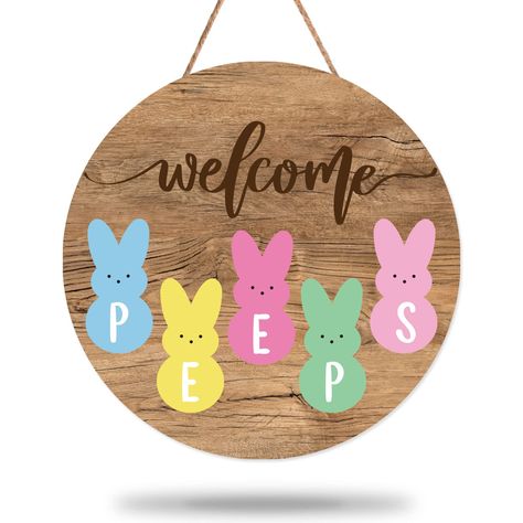 PRICES MAY VARY. Cute Design - There is 1pcs Easter wooden signs included in the package, patterned with bunny peeps, printed with the words of welcome and peeps against wood grain print background, cute and rustic, with a hemp rope for hanging, very easy to use. Proper Size - The wooden sign is measuring about 30 x 30cm/12 x 12 inch, proper size for your front door, window, wall, etc., bringing vitality into your home and party. Good Material - Made of durable wood, close to nature, safe and od Easter Wooden Door Hangers, Bunny Welcome Sign, Bakery Window, Coffee Shop Bakery, Welcome Sign Door, Easter Wood Signs, Bunny Peeps, Home Coffee Shop, Farmhouse Easter