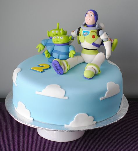 Buzz Lightyear birthday cake. Aliens, pizza planet. Toy story birthday cake by the Handmade Cake Company Pizza Planet Cake, Lightyear Birthday Cake, Toys Story Birthday, Fondant Characters, Toy Story Birthday Cake, Thomas Party, Buzz Lightyear Birthday, Planet Cake, Cake Designs For Kids