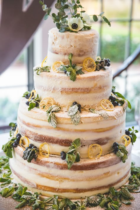 Naked wedding cake. Sweet & Sassy: Lemon pound cake, house-made blueberry compote, lemon-scented buttercream garnished with mint and sugar coated blueberries and lemons. Lemon Olive Oil Wedding Cake, Lemon Cake Wedding, Wedding Pound Cake, Tuscan Wedding Cake, Lemon Drizzle Wedding Cake, Wedding Cake Lemon, Summer Wedding Cake Flavors, Pound Cake Wedding Cake, Lemon Blueberry Wedding Cake