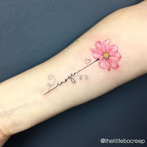 Delicate watercolour flower and name tattoo by Bex Fisher, Loughborough UK www.instagram.com/thelittlebocreep #bexfisher #thelittlebocreep #loughborough #loughboroughtattoo #loughboroughtattoos #leicestertattoo #uktattoo #femaleartist #femaletattoo #ukartist #midlandstattoo #script #name #nametattoo #imogen #floraltattoo #fineline #linetattoo #tattoo #naturetattoo #armtattoo #delicatetattoo #intricatetattoo #watercolour #watercolourtattoo #prettytattoo Flower With Script Stem Tattoo, Just Breathe Flower Tattoos For Women, Water Lily With Name Tattoo, Orchid Tattoo With Names, Names Tattoo Ideas, Orchid And Bee Tattoo, Kids Names Tattoo, Tattoo Ideas Cute, Tattoos For Childrens Names