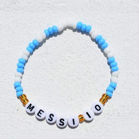 A Messi 10 bracelet is like a winning goal on your wrist! Picture sleek black vibes with the number 10 shining bright. Get it in the Argentinan colors of blue and white, or the bright pink of Inter Miami! it's the ultimate accessory for game days or to flaunt your soccer love every day. Whether for you or someone else, this would be a great gift for the Messi fan in your life! #SoccerFanStyle #MessiMagic ⚽🌟 Messi Bracelet, Soccer Bracelets, Messi Magic, Soccer Love, Black Vibes, Football Bracelet, Friendship Bracelet Patterns Easy, Inter Miami, Fan Style