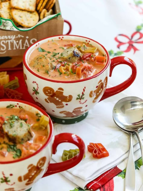 We all want warm comfort food during the holiday season, and Christmas Soup is such an easy recipe to put together! The best part is you can make it in a slow cooker or simmer it on the stove for Christmas day, holiday parties, or an easy family dinner. Scoop into big bowls or hot mugs to dip breadsticks, croutons, or crackers into this merry, cheesy soup. 7 Can Christmas Soup, Christmas Eve Soup Ideas, Soup Christmas Gift, Christmas Soup Ideas, Soup Night Party, Soup Christmas, Christmas Soups Party, Soup Sampler Party, Christmas Soups