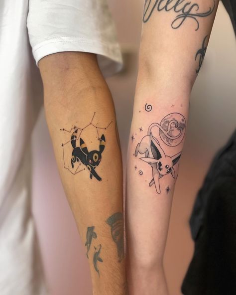 Umbreon X Espeon 🌑🌸✨ . . . . 💌 Info & Booking in DM . #tattoo #tattooideas #umbreon #espeon #empoli #art #danafirenze #inked #blkttt #pokemonart #pokemontattoo #pokémon #umbreonxespeon Pokemon Forearm Tattoo, Umbreon And Espeon Matching Tattoos, Umbreon Espeon Tattoo, Umbreon Tattoo Ideas, Eevee Tattoo Design, Umbreon And Espeon Tattoo, Matching Friends Tattoo, Eeveelution Tattoo, Small Pokemon Tattoo