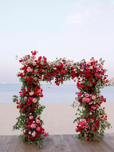 Romantic Red And Pink Wedding, Light Pink And Red Wedding Flowers, Red Floral Arch Wedding, Red And Pink Tropical Wedding, Red Pink And White Wedding Flowers, White Pink Red Wedding, Red And White Beach Wedding, Rose Garden Theme Wedding, Shades Of Pink And Red Wedding